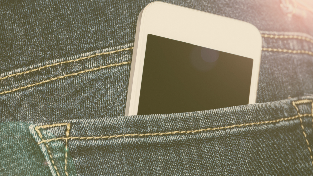 smart phone in jeans pocket