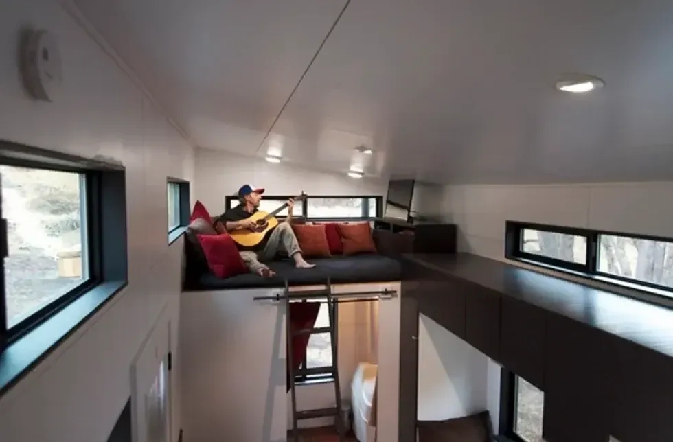Upstairs in bed with the guitar