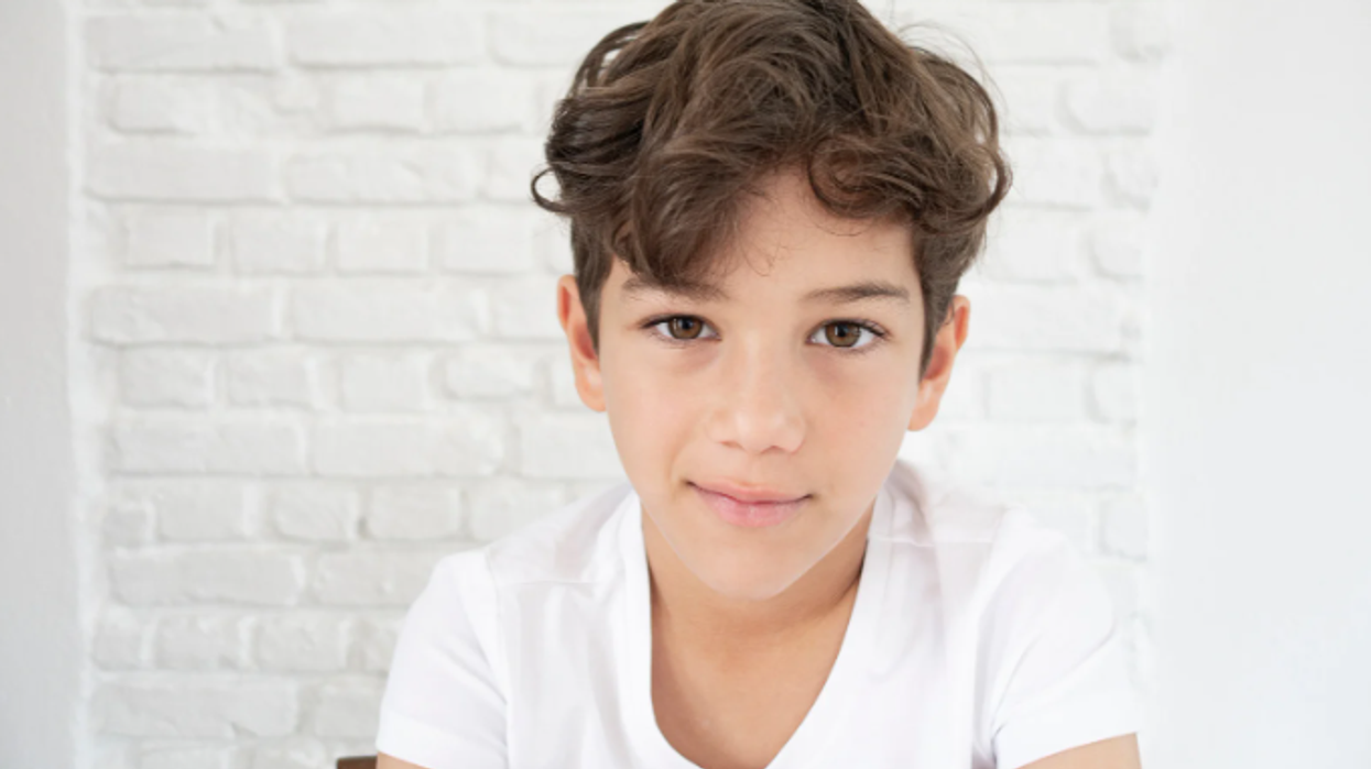 young boy, serious young boy, seven year old, brown hair, healthy kid
