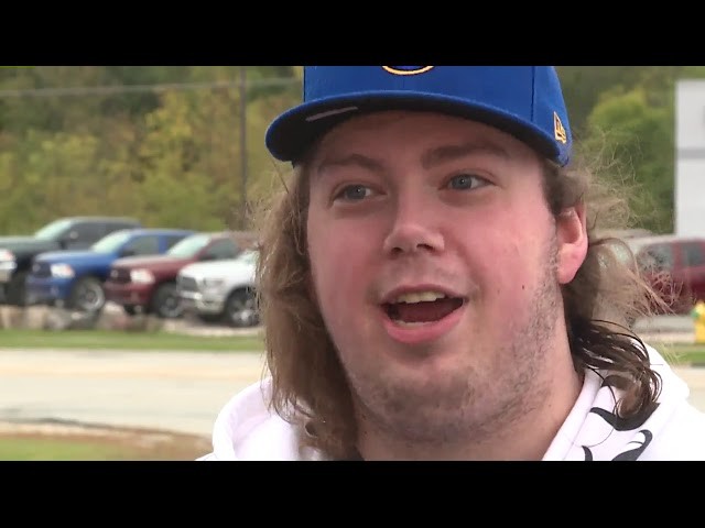 Pizza delivery driver Joey Grundl speaks in an interview