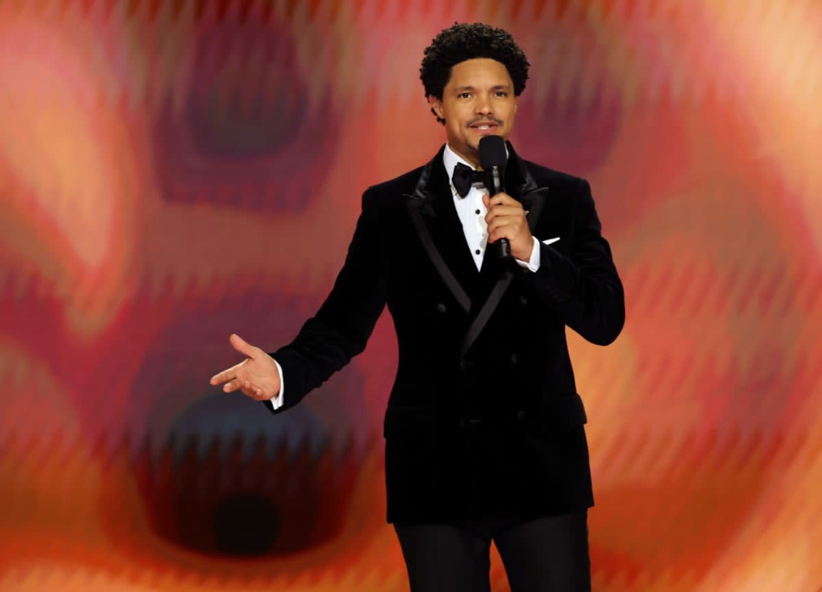 LOS ANGELES, CALIFORNIA - FEBRUARY 04: Trevor Noah speaks onstage during the 66th GRAMMY Awards at Crypto.com Arena on February 04, 2024 in Los Angeles, California. (Photo by Kevin Winter/Getty Images for The Recording Academy)