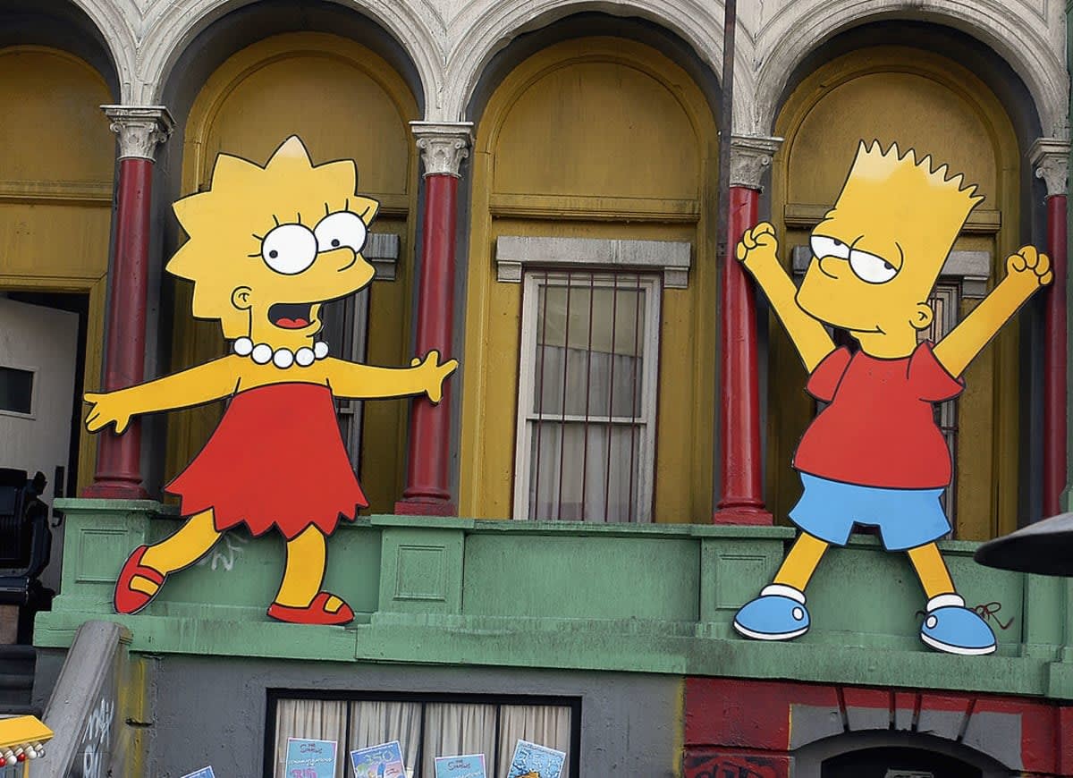 LOS ANGELES, CA - APRIL 25: Lisa Simpson and Bart Simpson cut-outs on display at