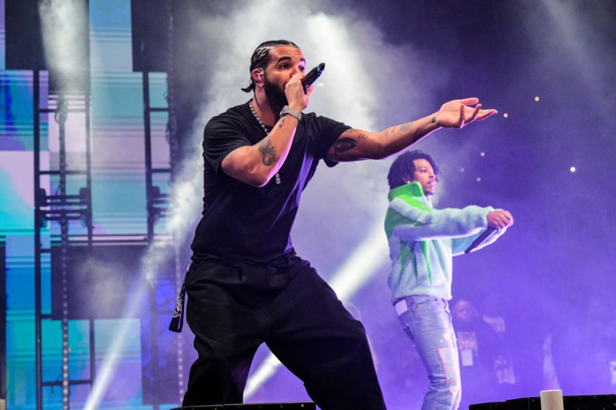 ATLANTA, GA - DECEMBER 9: Drake and 21 Savage perform onstage during