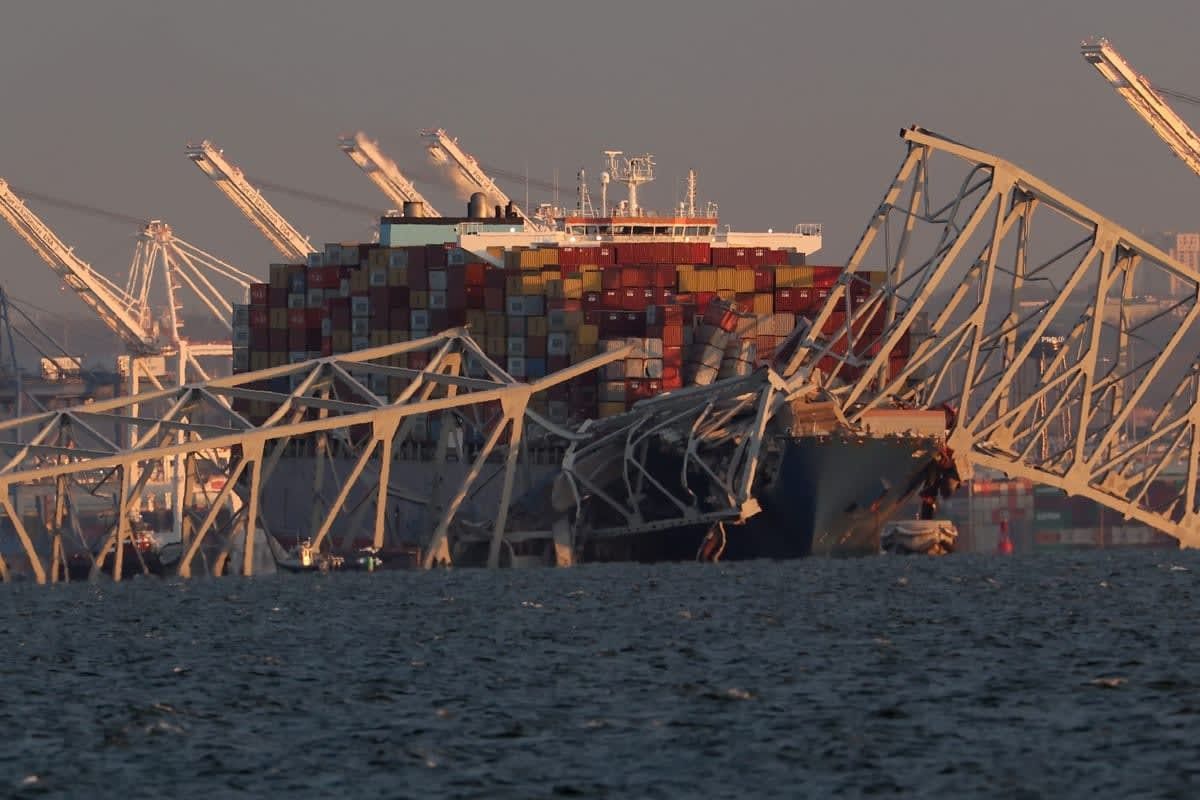 Image Source:  A cargo ship is shown after running into and collapsing the Francis Scott Key Bridge on March 26, 2024 in Baltimore, Maryland. Rescuers are searching for at least seven people, authorities say, while two others have been pulled from the Patapsco River. (Photo by Rob Carr/Getty Images)