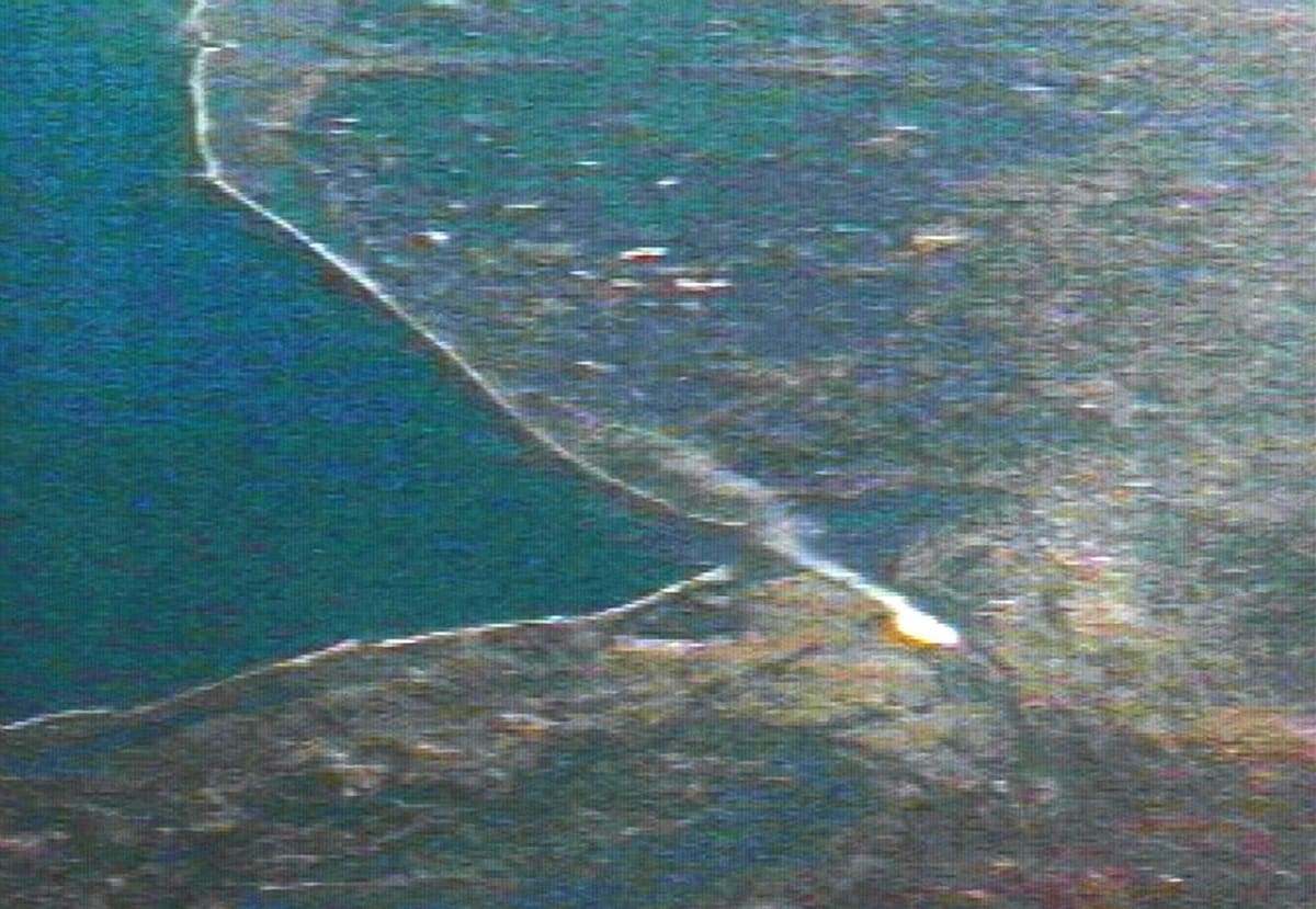 Image source: A still image, taken from video sent from the International Space Station showing a smoke plume rising from the Manhattan borough September 11, 2001 in New York City. The view was taken at an altitude of approximately 250 miles. (Photo by Frank Culbertson/Courtesy of NASA/Getty Images)