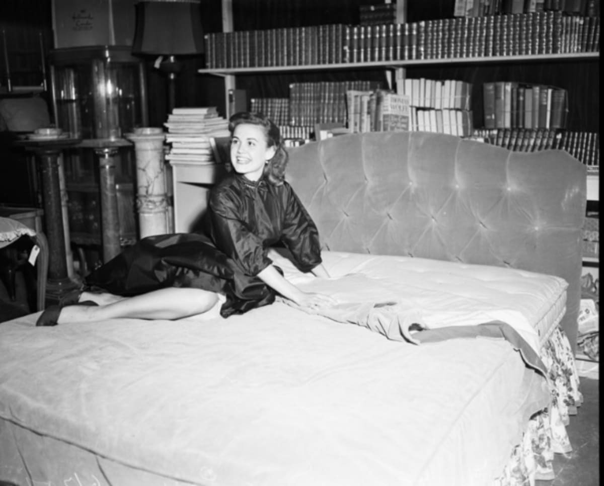 Image source: Hedy Lamarr auction, June 25, 1951. Anne Paige; Jimmy McHugh; Jeannie McLaren.; More descriptive information with originals.. (Photo by Los Angeles Examiner/USC Libraries/Corbis via Getty Images)