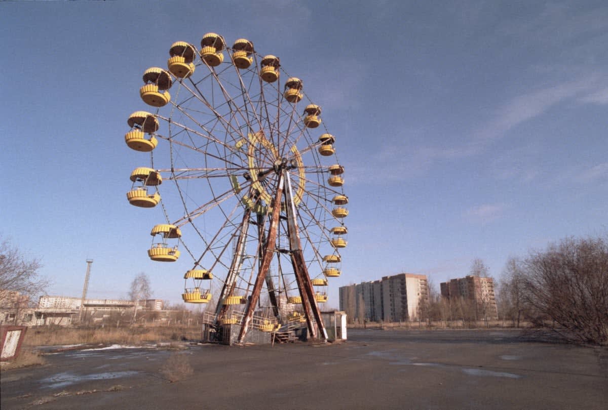 Image Source: Abandoned Ferris Wheel in the Pripyat Central Park, evacuated town, two kilometres from the Chernobyl power station, November 1995. (Photo by Martin Godwin/Getty Images)