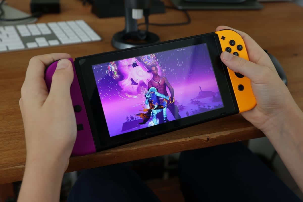 Image Source: 11-year-old Ansel, the photographer's son, plays Fortnite. (Photo by Neilson Barnard/Getty Images)