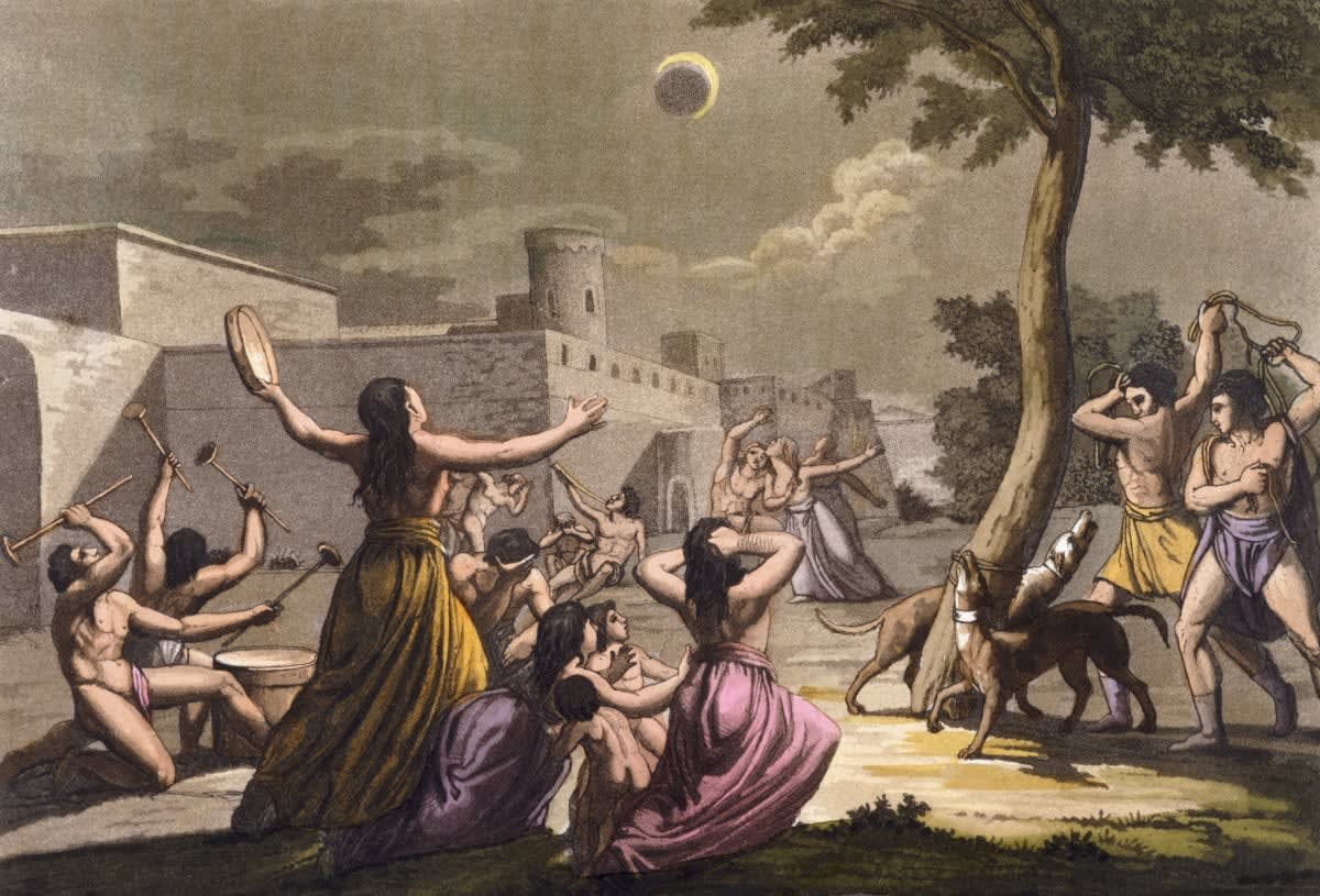 A print of native American Indians celebrating the eclipse of the moon by G. Gallina. (Photo by © Historical Picture Archive/CORBIS/Corbis via Getty Images)