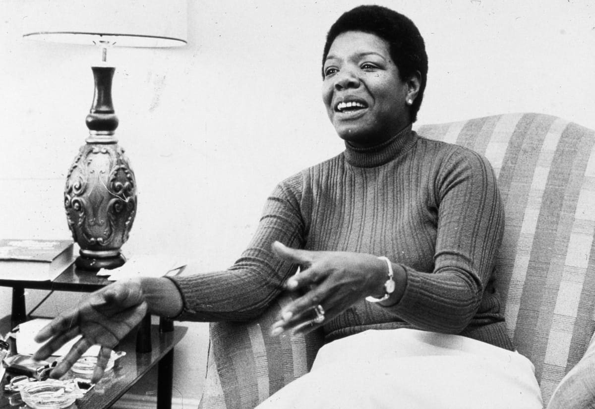Image Source: American poet and author Maya Angelou gestures while speaking in a chair during an interview at her home. (Photo by Jack Sotomayor/New York Times Co./Getty Images)