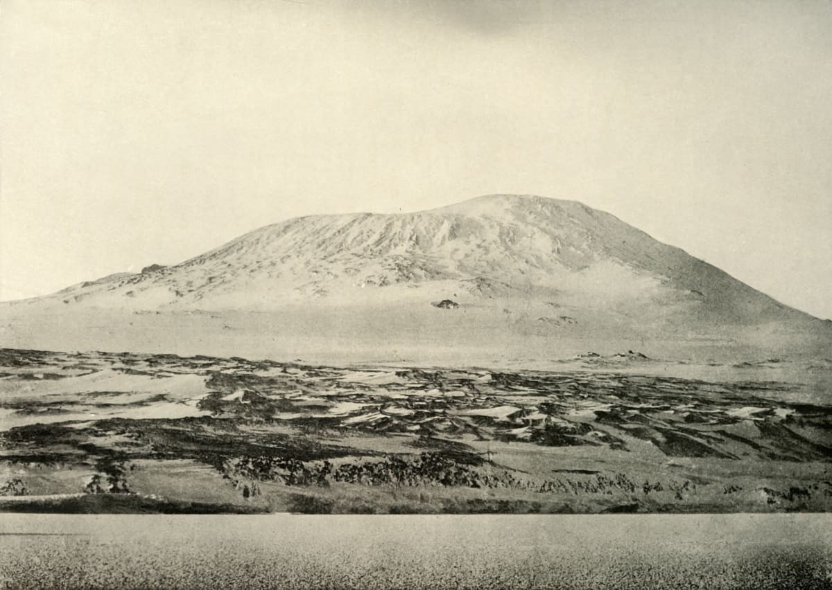 Image Source: Mount Erebus as Seen from the Winter Quarters, The Old Crater on the Left, and the Active Cone Rising on the Right', circa 1908, (1909). (Photo by Print Collector/Getty Images)