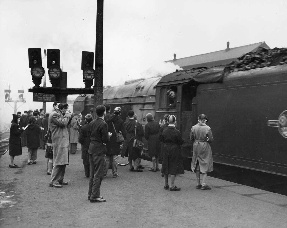 Image Source: 14th February 1959: A league of trainspotters young and old crowd the number 10 platform at London's King's Cross Station. (Photo by Harry Todd/Fox Photos/Getty Images)