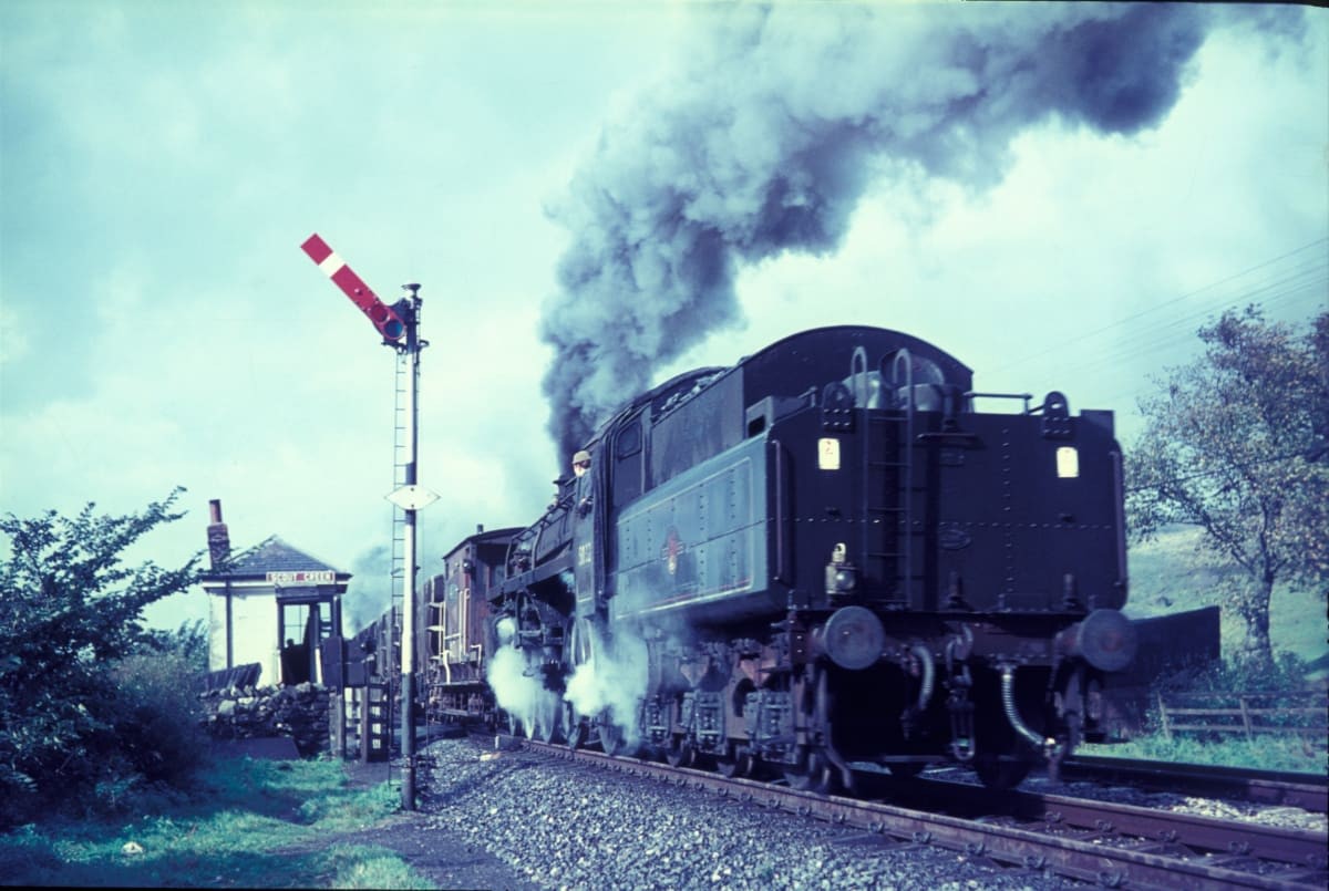 Image Source: A British Railway's Standard 4 Class 4-6-0, one of several allocated to Tebay for banking duties, on the 1 in 75 climb up Shap Fell. Scout Green signal box is in the background. Wednesday 27th September 1967. (Photo by Rail Photo/Construction Photography/Avalon/Getty Images)