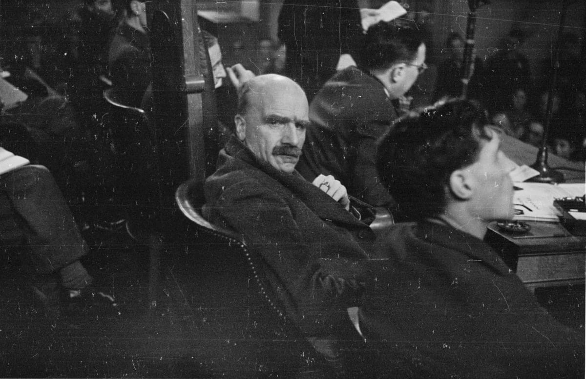 Image Source: British biologist J. B. S. Haldane sits on the panel of a conference held by the Association of Scientific Workers. (Photo by Felix Man/Picture Post/Hulton Archive/Getty Images)