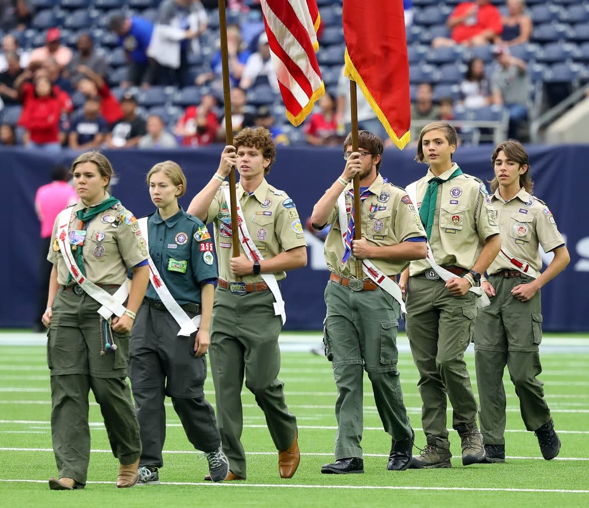 Image Source: Boy Scouts of America present the colors during the national anthem before the Los Angeles Rams and the Houston Texans at NRG Stadium on October 31, 2021 in Houston, Texas. (Photo by Bob Levey/Getty Images)