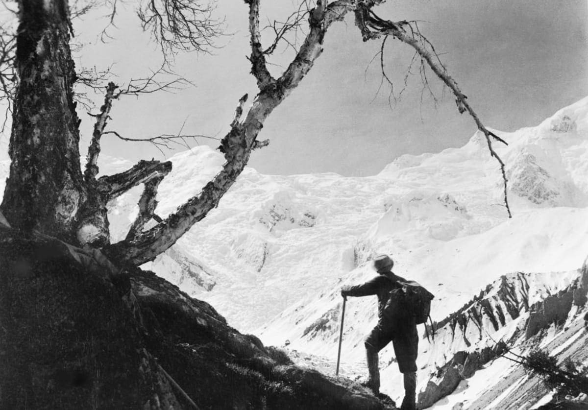 Representative Image Source: A mountaineer stops to admire the view of Mt Everest in the middle of the Himalayas. (Photo by Three Lions/Getty Images)