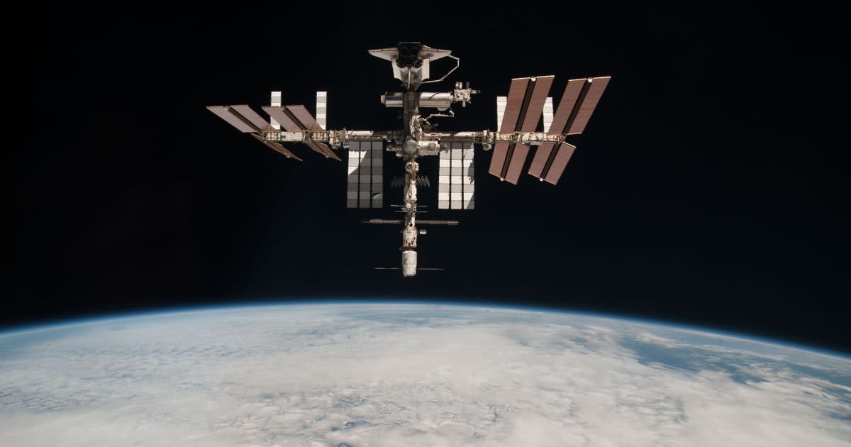 Image Source : In this handout image provided by the European Space Agency (ESA) and NASA, the International Space Station and the docked space shuttle Endeavour orbit Earth during Endeavour's final sortie on May 23, 2011 in Space.(Photo by Paolo Nespoli - ESA/NASA via Getty Images)