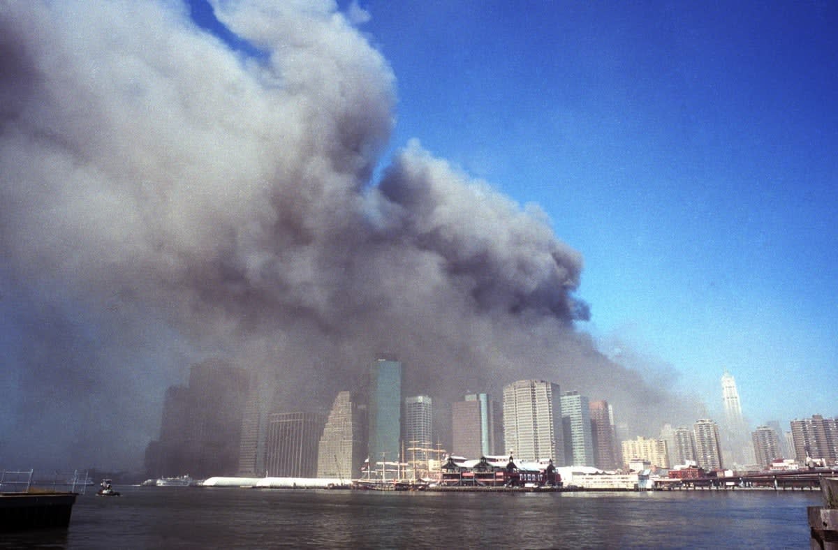 Image Source: Neville Elder's photographs of downtown Manhattan on 9/11/01 were published worldwide. The picture shows the Downtown Manhattan skyline (view from Brooklyn) as it was on September 11, 2001. (Photo by Neville Elder/Getty Images)