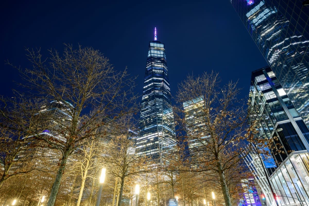 Image Source: A view of the One World Trade Center as seen from the 9/11 Memorial in Downtown Manhattan on January 29, 2023 in New York City. (Photo by Roy Rochlin/Getty Images)