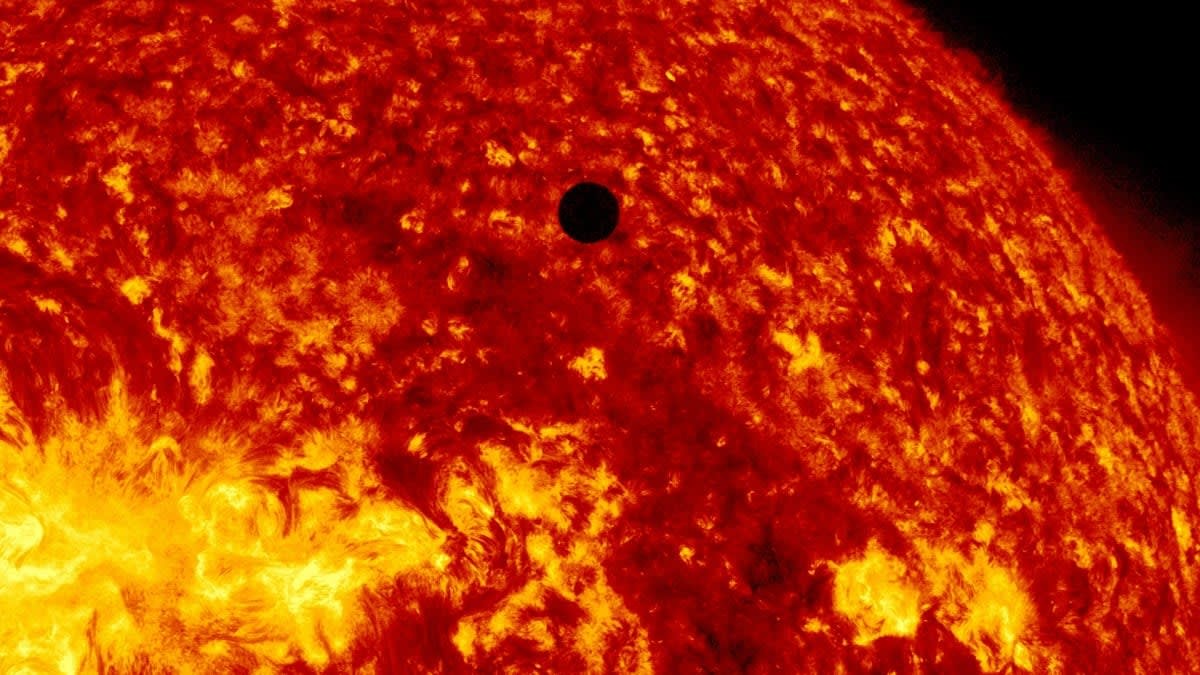 Image Source: In this handout image provided by NASA, the SDO satellite captures a ultra-high definition image of the Transit of Venus across the face of the sun at on June 5, 2012 from space.  (Photo by SDO/NASA via Getty Images)