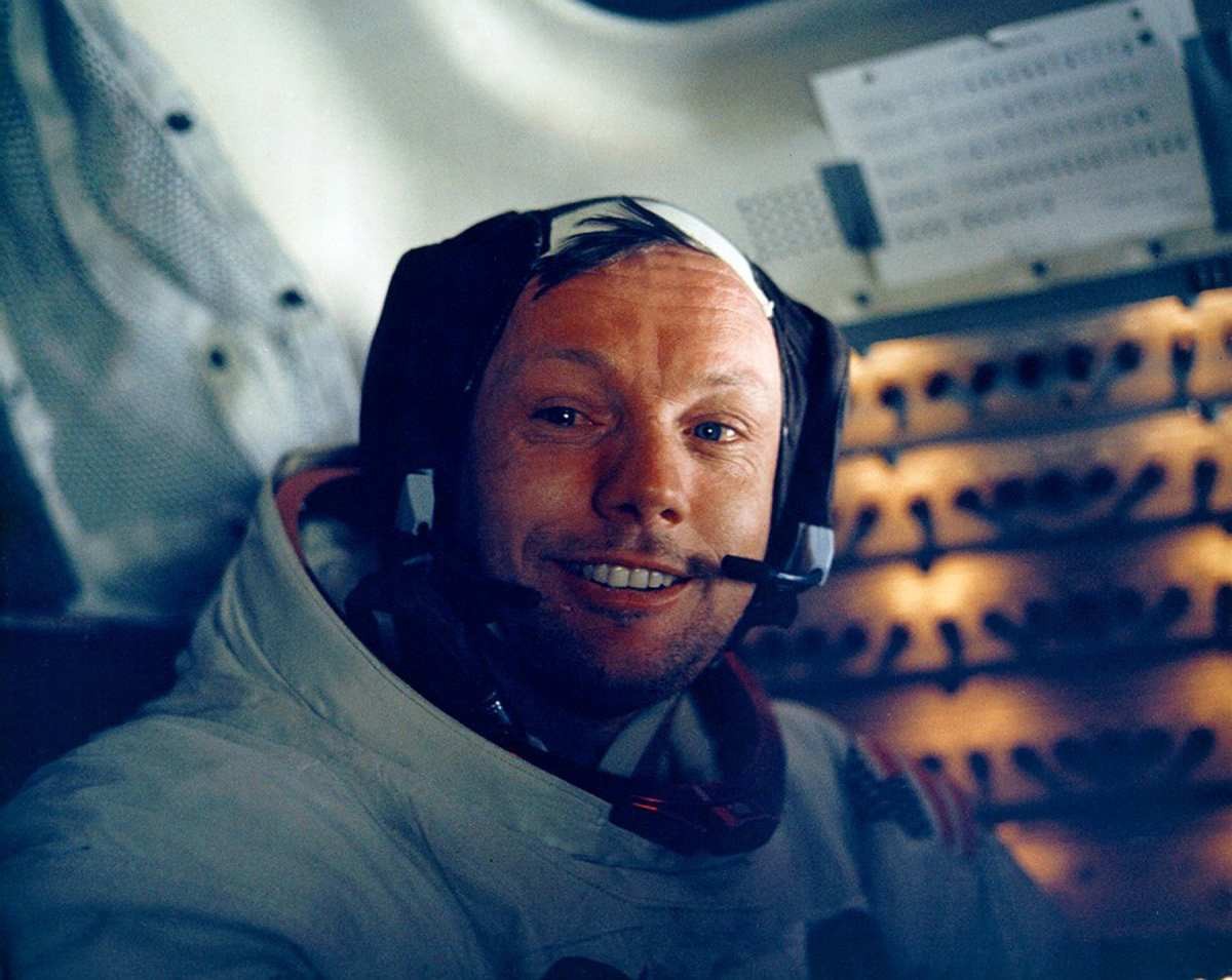 Image Source: Astronaut Neil Armstrong smiles inside the Lunar Module July 20, 1969.(Photo by NASA/Newsmakers)
