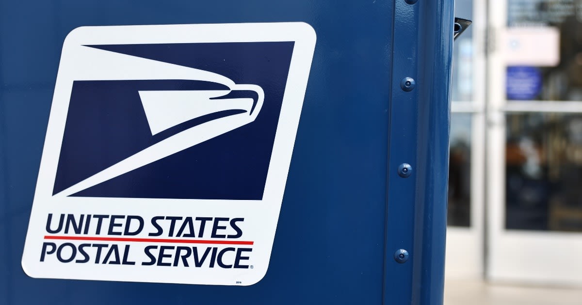 Image Source: A United States Postal Service logo is displayed on a U.S. Post Office mailbox on April 1, 2024 in Montclair, California. (Photo by Mario Tama/Getty Images)