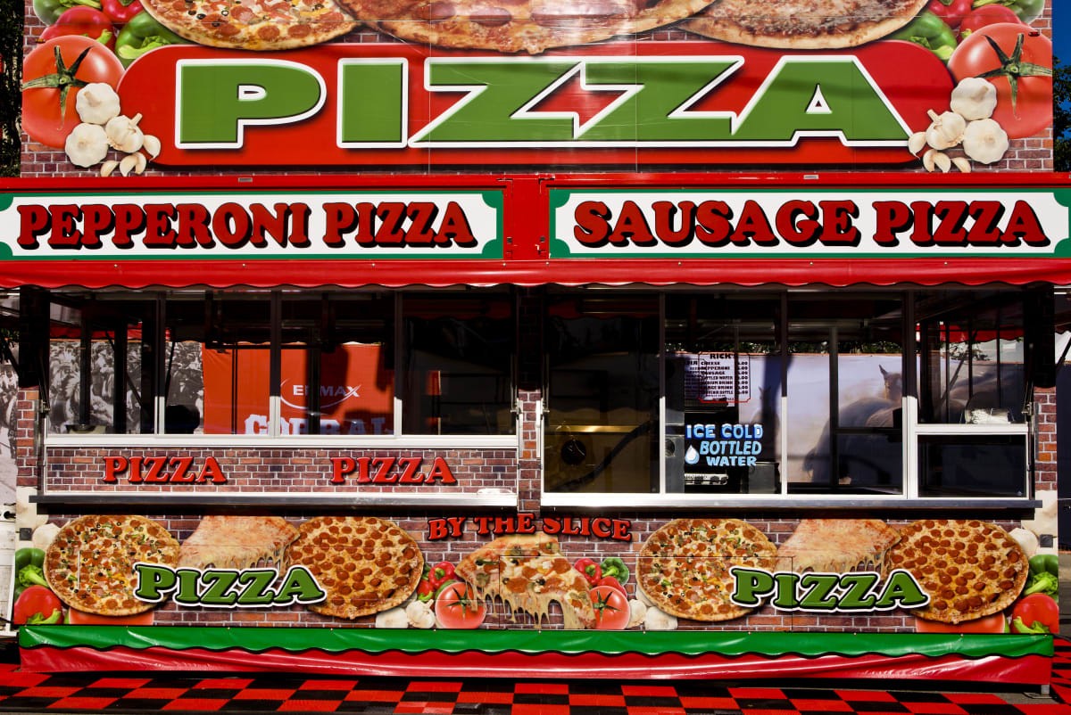Image Source: Pizza stand in Calgary, Canada. Calgary. (Photo by George Rose/Getty Images)