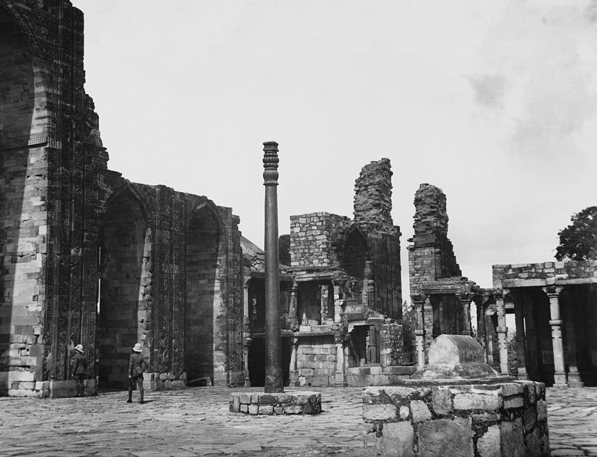 Image Source: The 7-meter-high Iron Pillar stands in the courtyard of the ruined 12th century Quwwat-ul-Islam Masjid mosque. The pillar is believed to have been moved to the site from a Vishnu temple at Bihar, for the Rajput chief, Anang Pal. (Photo by © Hulton-Deutsch Collection/CORBIS/Corbis via Getty Images)
