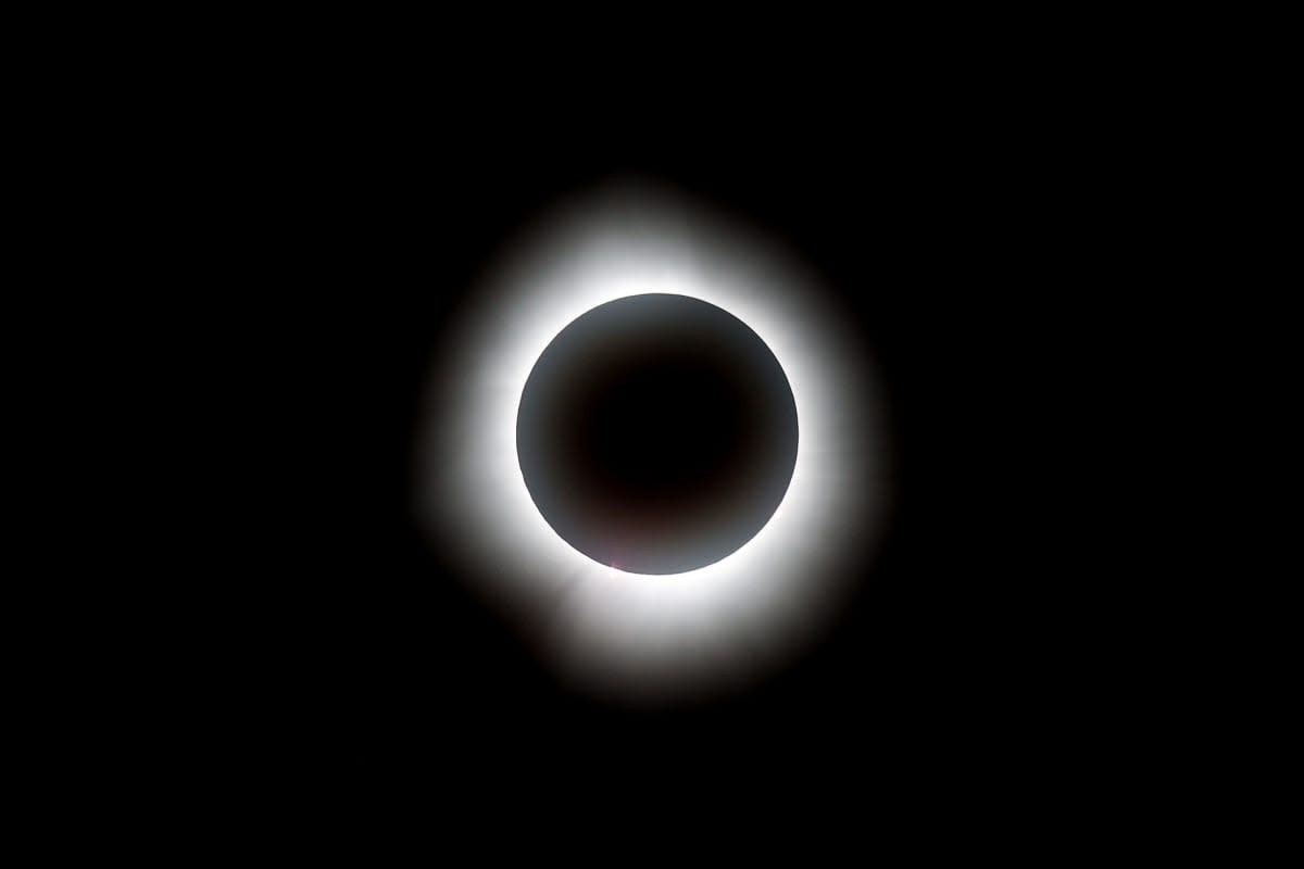 Image Source: The total solar eclipse is seen before the game between the Cleveland Guardians and the Chicago White Sox at Progressive Field on April 08, 2024 in Cleveland, Ohio. (Photo by Mike Lawrie/Getty Images)