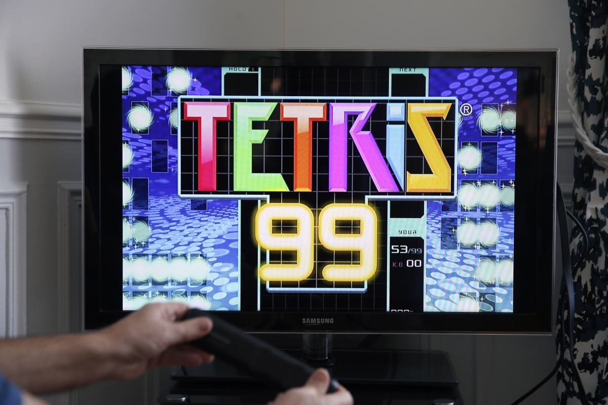 Image Source:  In this photo illustration a gamer plays the game Tetris 99 developed by Arika and published by Nintendo on February 18, 2019 in Paris, France. Last Wednesday the Japanese company Nintendo unveiled its new game Tetris 99, a Battle Royale version of the legendary Tetris. (Photo by Chesnot/Getty Images)
