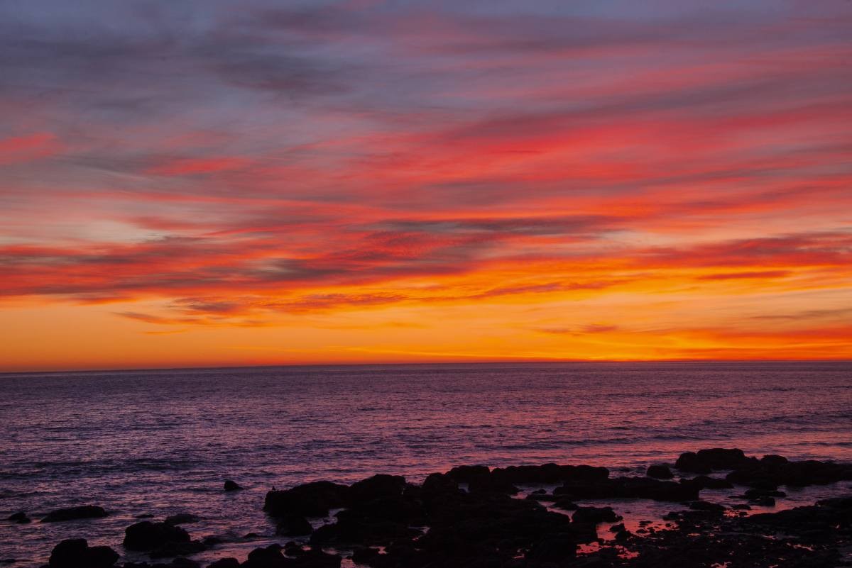 Representative Image Source: The clouds turn a golden yellow, red, orange and pink in the remnants of a blue sky and reflect in the tide pools created by the rocks at low tide on the beach in 2011 in Malibu, California. (Photo by Roxanne McCann/Getty Images)