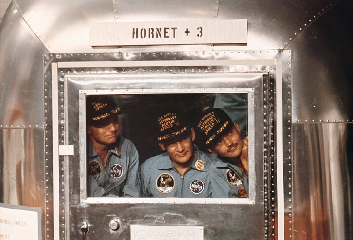 Image Source: Apollo 11 astronauts the day after their successful splashdown in the Pacific. LTR: Neil Armstrong, Buzz Aldrin, and Michael Collins.