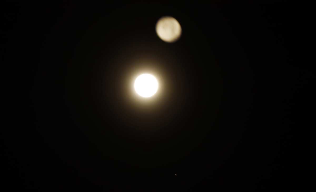 Representative Image Source:  The full Cold Moon is reflected in a window as it sets with planet Mars on December 8, 2022, in Hoboken, New Jersey. (Photo by Gary Hershorn/Getty Images)