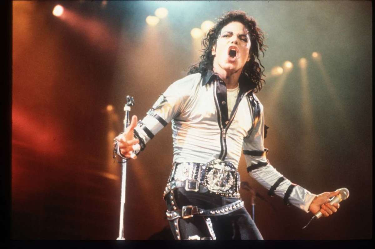 Image Source: Michael Jackson performs at a concert November 8, 1988 in California. Jackson reached the peak of his solo career with 1982's