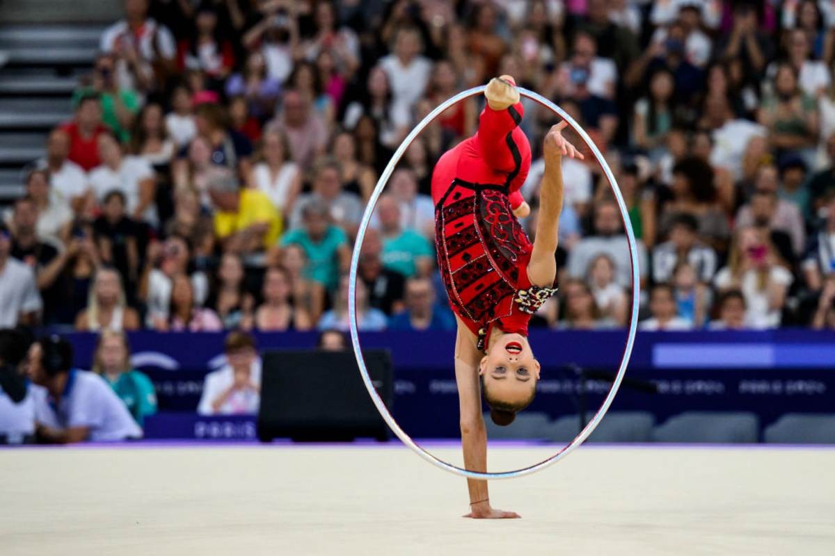 Image Source: Taisiia Onofriichuk of Team Ukraine competes during the Rhythmic Gymnastics at the Porte de La Chapelle Arena on August 9, 2024 in Paris, France. (Photo by Tom Weller/VOIGT/GettyImages)