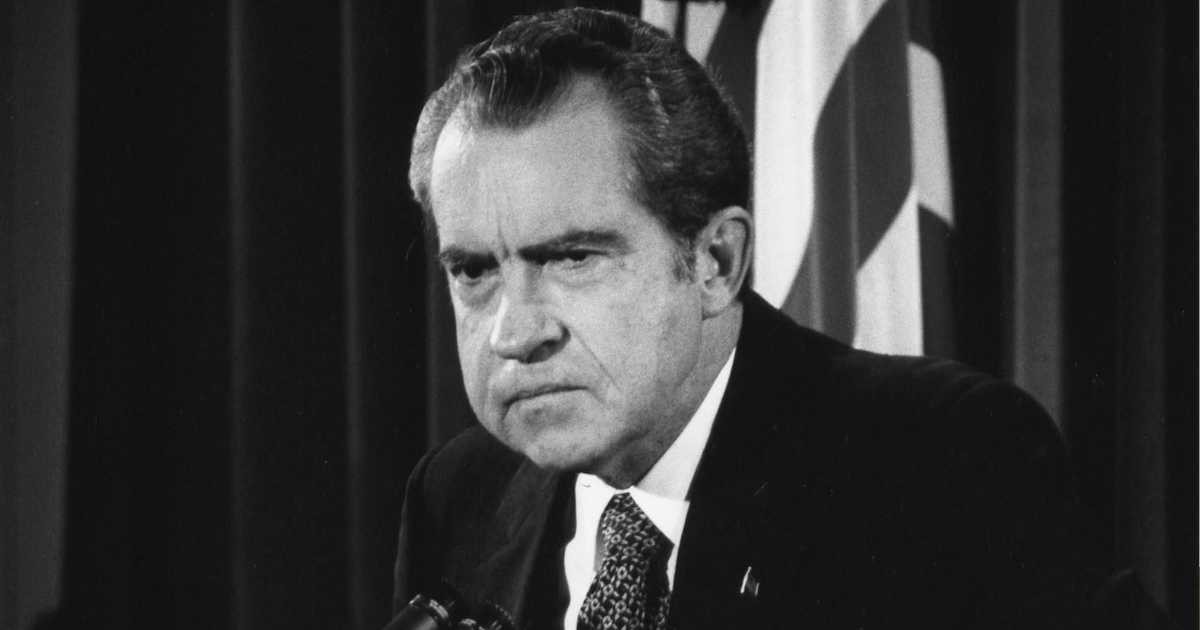Image Source: US President Richard Nixon answers questions about the Watergate scandal in the East Room of the White House on October 1973 in Washington, DC. (Photo by David Hume Kennerly/Getty Images)