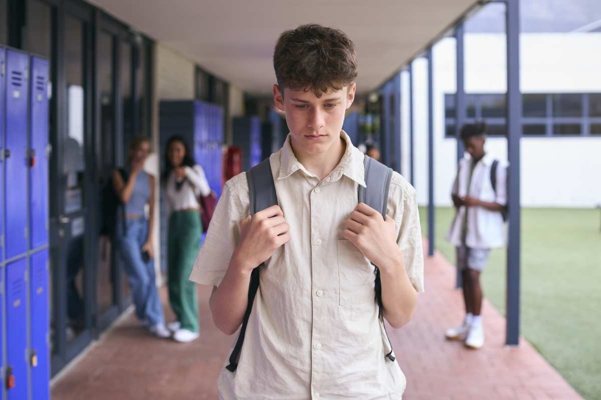 Representative Image Source: Unhappy Teenage Boy Outdoors At High School Being Teased Or Bullied (Getty Images)