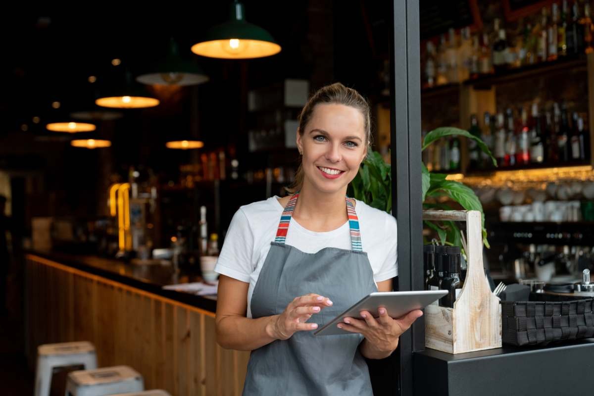 Representative Image Source: Happy waitress working at a cafe using a tablet computer and looking at the camera smiling (Getty Images)
