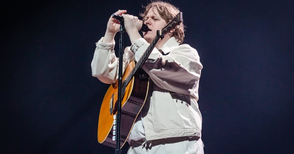 Image Source: British singer Lewis Capaldi performs live on stage during a concert at the Mercedes-Benz Arena on February 16, 2023 in Berlin, Germany. (Photo by Frank Hoensch/Redferns)