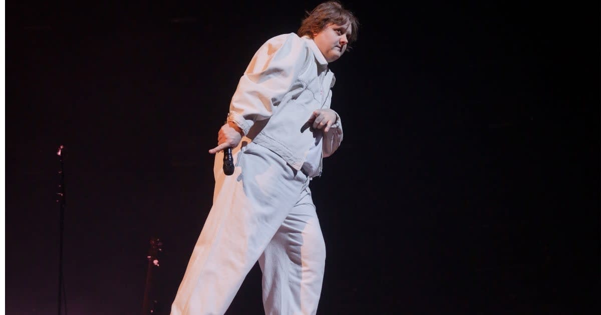 Image Source: British singer Lewis Capaldi performs live on stage during a concert at the Mercedes-Benz Arena on February 16, 2023 in Berlin, Germany. (Photo by Frank Hoensch/Redferns)