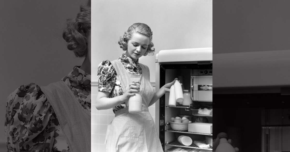 Representative Image Source: 1930s WOMAN HOUSEWIFE WEARING A WHITE APRON TAKING MILK OUT OF THE REFRIGERATOR (Photo by H. Armstrong Roberts/ClassicStock/Getty Images)