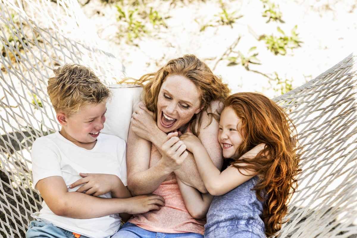 Representative Image Source: Happy mother with children in hammock (Getty Images)