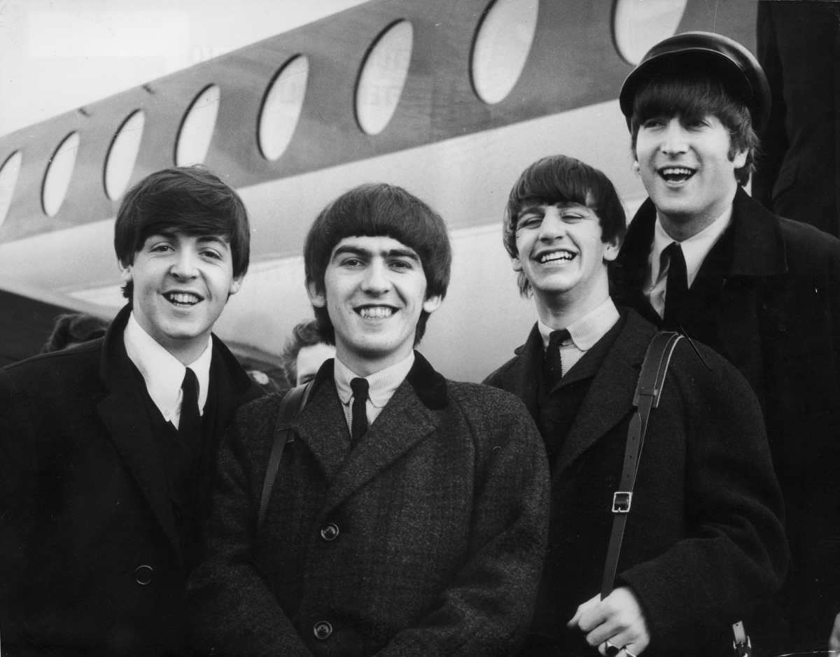 Representative Image Source: February 1964: The Beatles arriving at London Airport after a trip to Paris. (L-R) Paul McCartney, George Harrison, Ringo Starr and John Lennon. (Photo by Evening Standard/Getty Images)