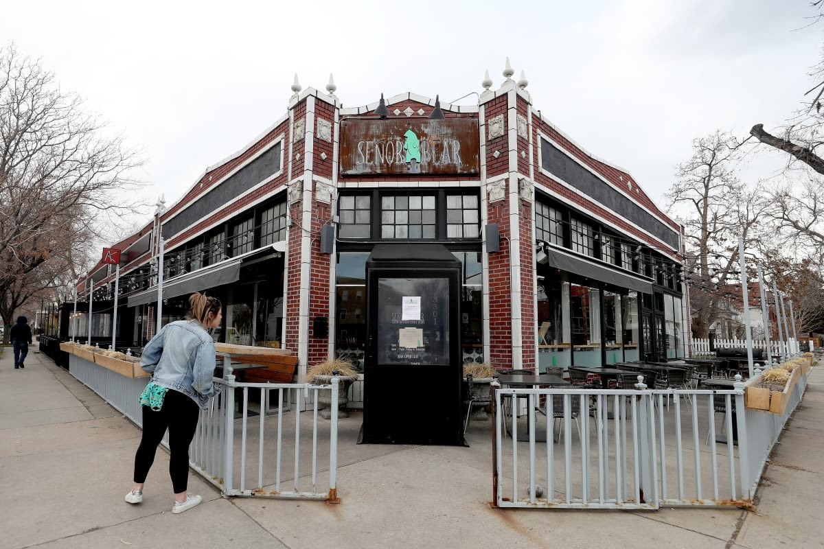 Image Source: Tables sit empty in the Lower Highlands neighborhood in Denver, Colorado. (Photo by Matthew Stockman/Getty Images)