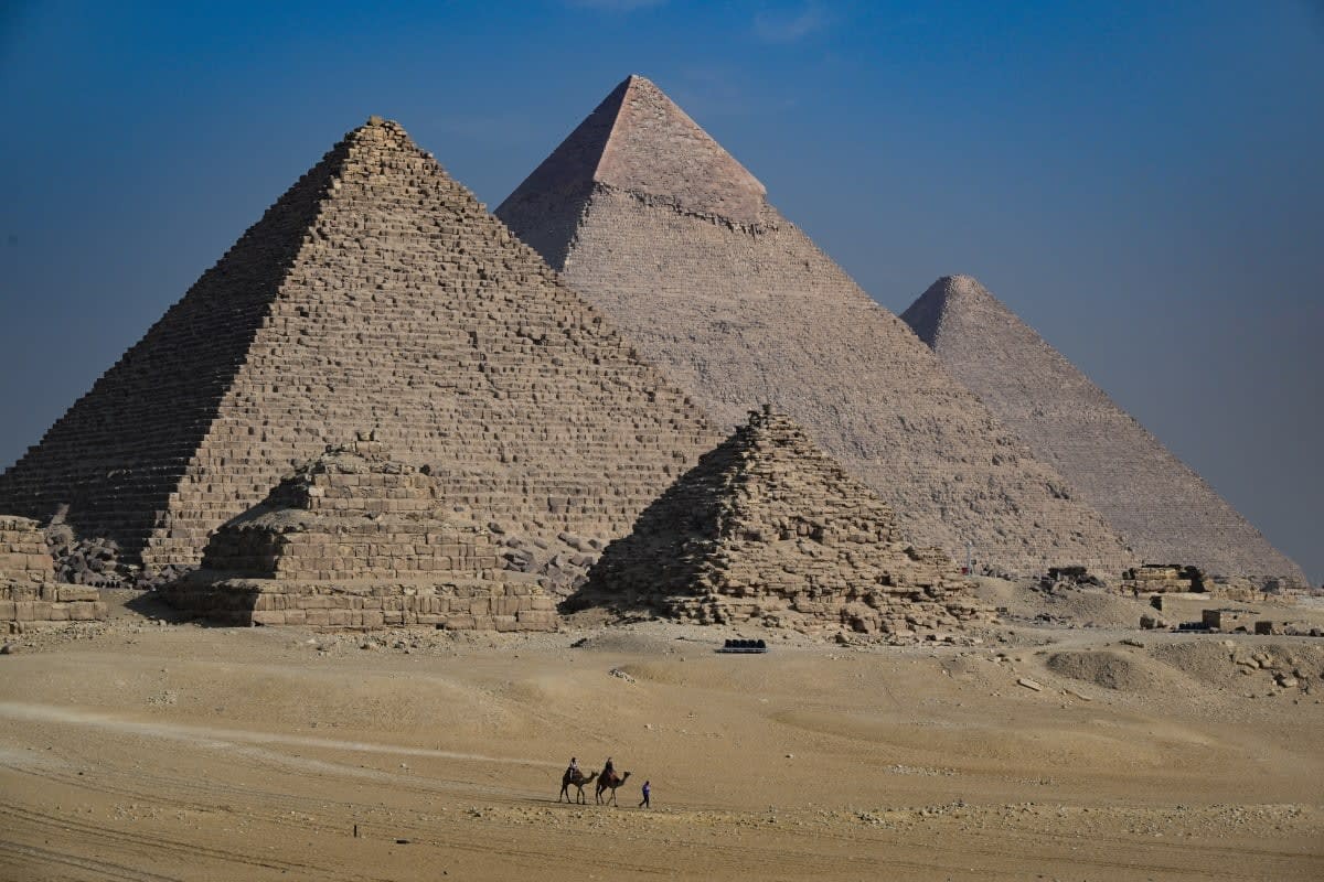 Image Source: GIZA, EGYPT - DECEMBER 03: General view of the Giza Pyramids on December 03, 2022 in Giza, Egypt. (Photo by Stephane Cardinale - Corbis/Corbis via Getty Images)