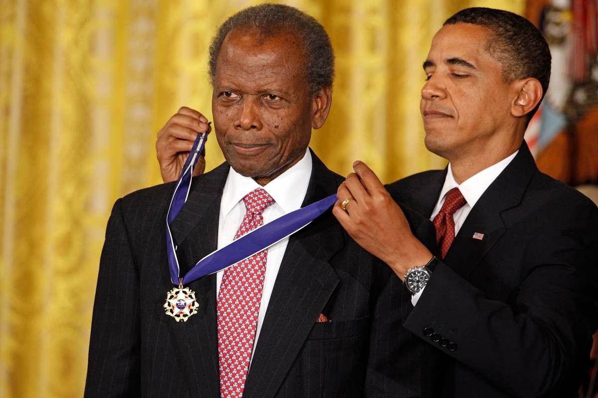 Image Source: President Barack Obama presents the Medal of Freedom to Academy Award-winning actor Sidney Poitier during a ceremony in White House August 12, 2009. (Photo by Chip Somodevilla/Getty Images)