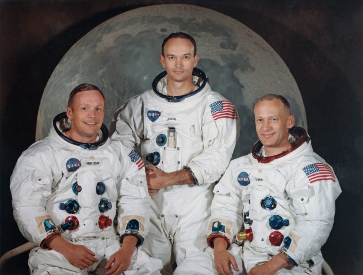 The three crew members of NASA's Apollo 11 lunar landing mission pose for a group portrait a few weeks before the launch, May 1969. From left to right, Commander Neil Armstrong, Command Module Pilot Michael Collins and Lunar Module Pilot Edwin 'Buzz' Aldrin Jr. (Photo by Space Frontiers/Getty Images)