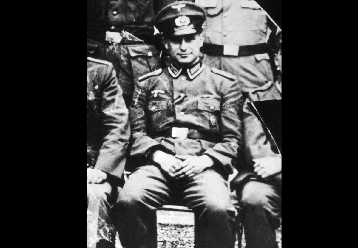 Image Source: German SS officer and Nazi war criminal Klaus Barbie (1913 - 1991) in army NCO uniform, 1944. (Photo by Gabriel Hackett/Hulton Archive/Getty Images)