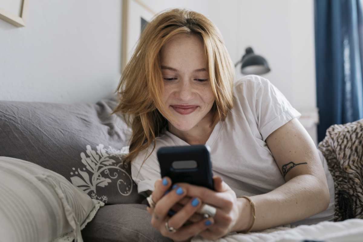 Representative Image Source: A woman at home messaging on an online dating app using her smartphone| Getty Images