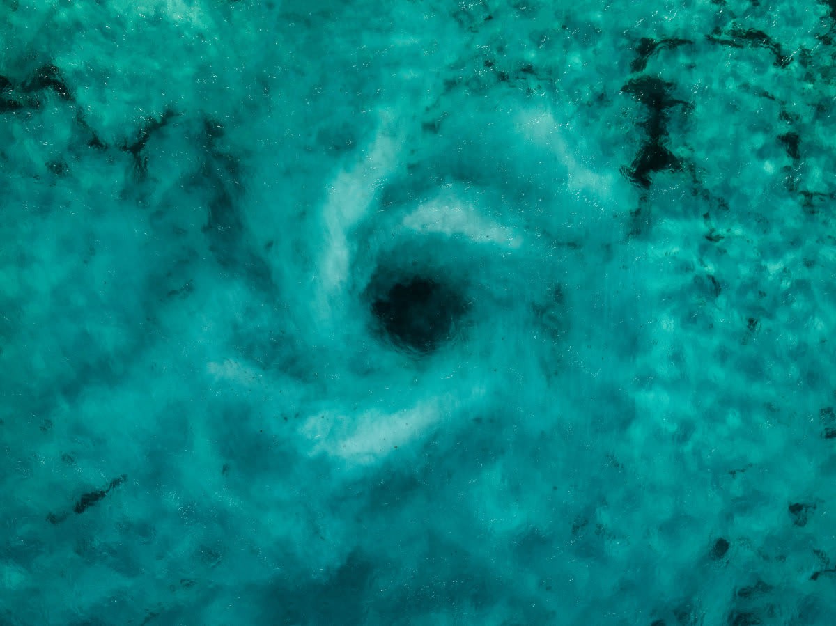 Representative Image Source: Drone image looking down on a vortex of water in the Southern Ocean, Esperance, Western Australia, Australia (Getty Images)